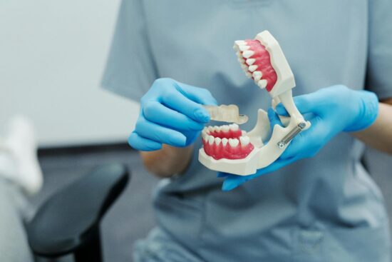 Fixed orthodontic treatments in Winnipeg use brackets and wires attached to the teeth